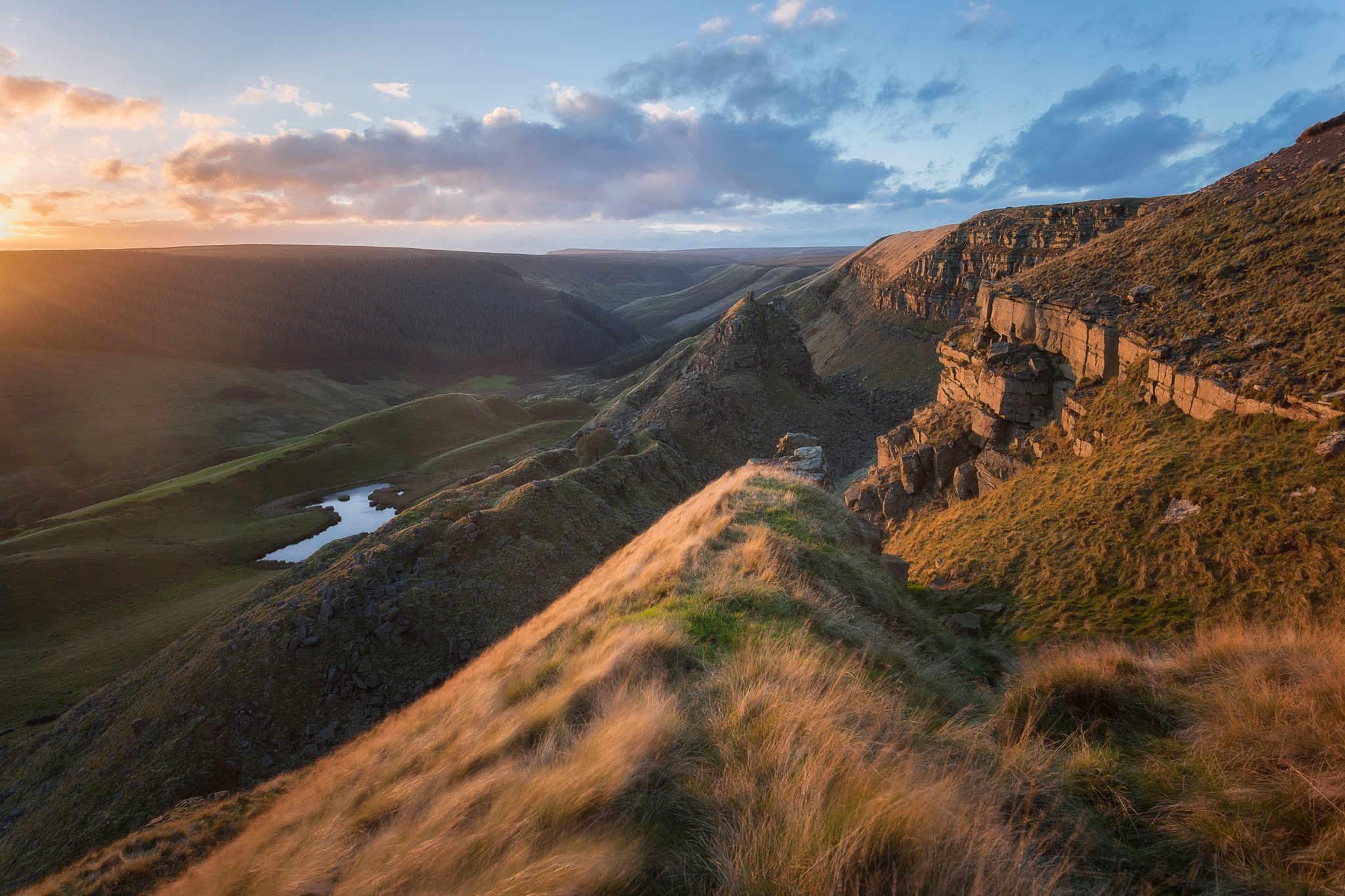 Alport Castle in The Peak District at sunset.