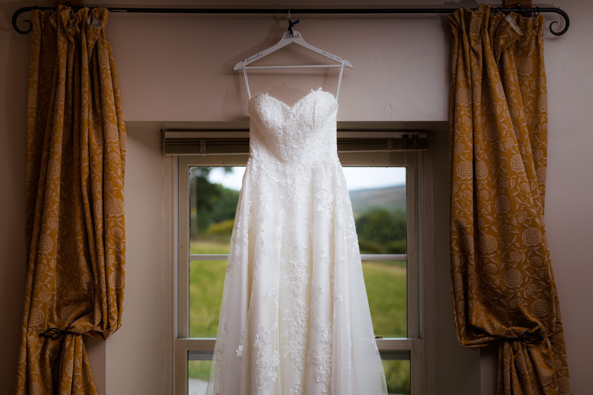 Sarah’s beautiful wedding dress hung up ready to be worn at Losehill House.