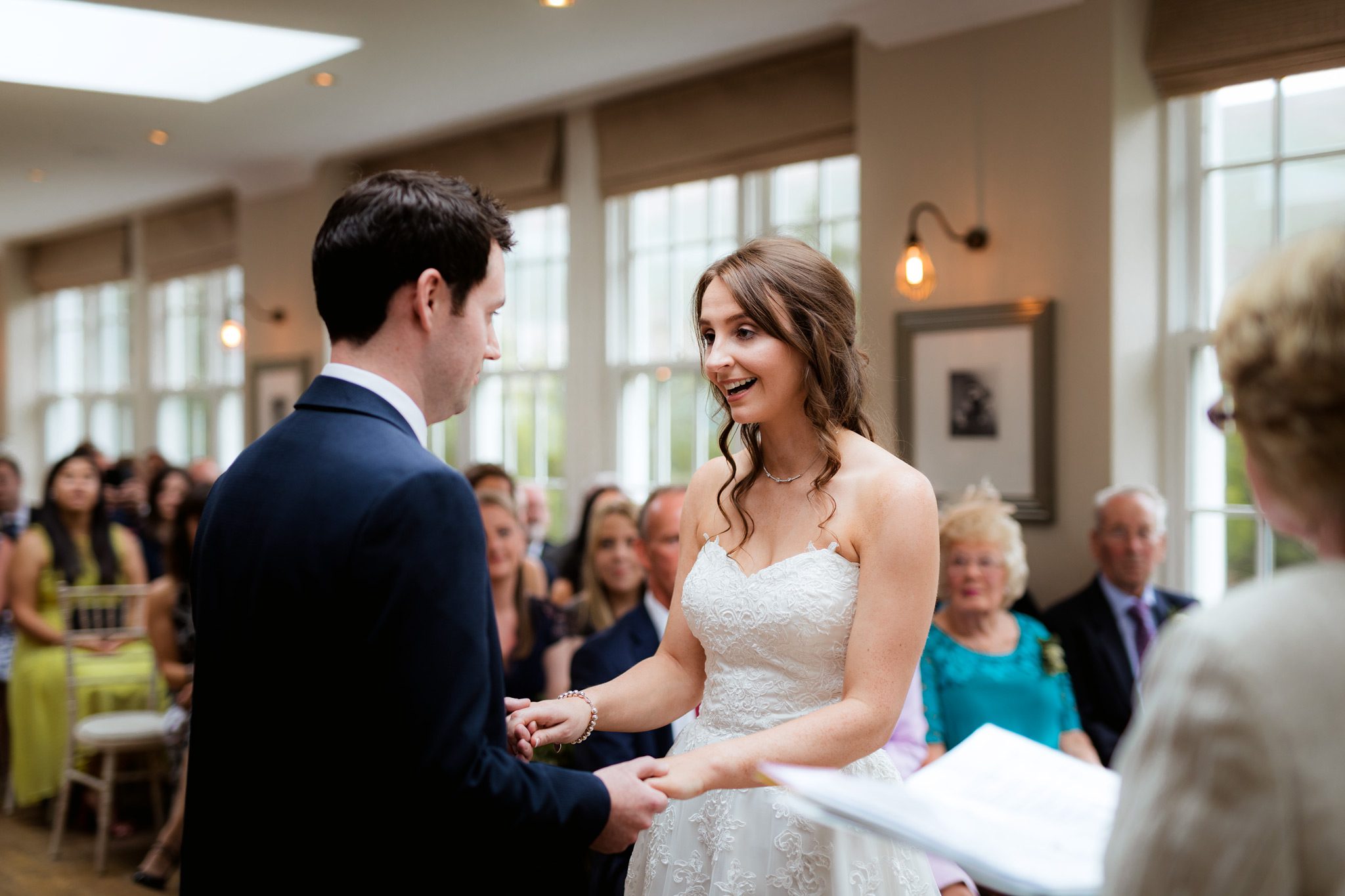 Sarah and Ryan exchanging vows at Losehill House.